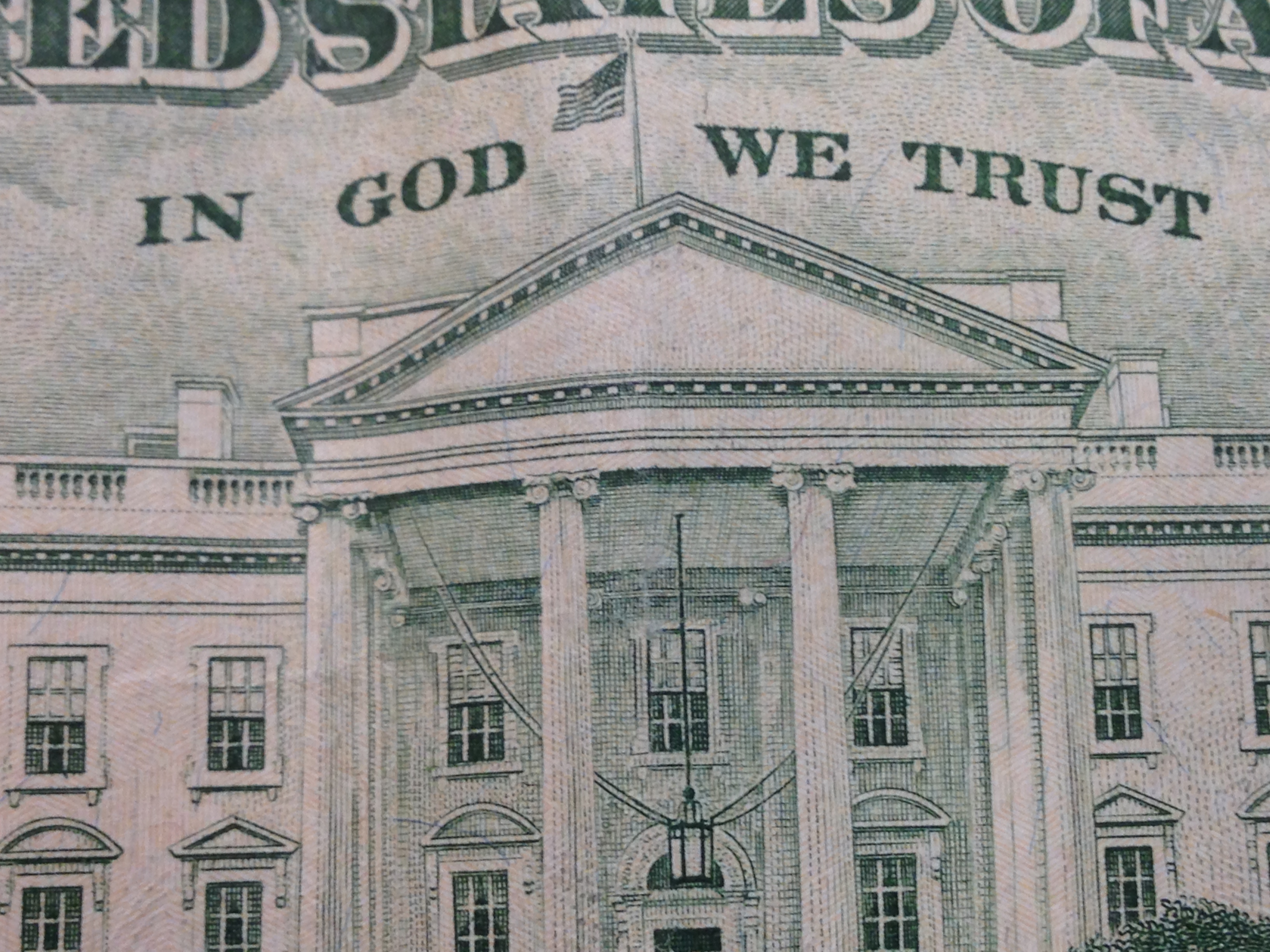 Close-up of White House on US dollar